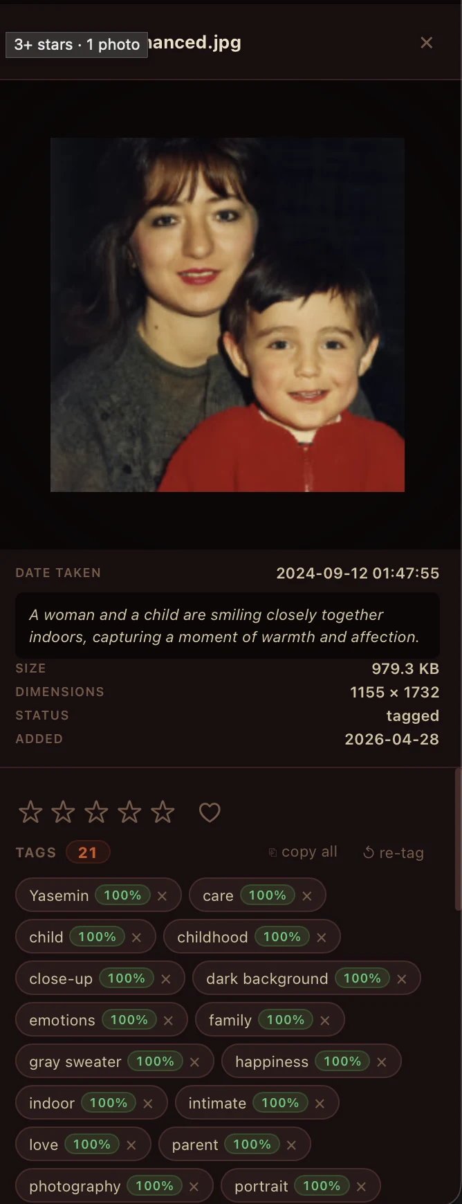 RetinaTag photo detail panel showing 16 AI-generated tags at 100% confidence: Yasemin, care, child, childhood, close-up, dark background, emotions, family, gray sweater, happiness, indoors, intimate, love, parent, photography, portrait